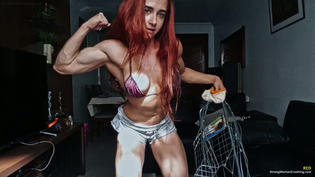 RED destroys and bends a metal Fair cart - muscular woman strength video