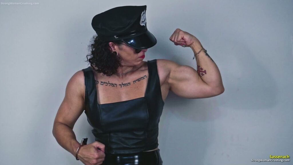 Sassenach Bursts Metal Handcuffs with Raw Bicep Power - muscular woman strength video